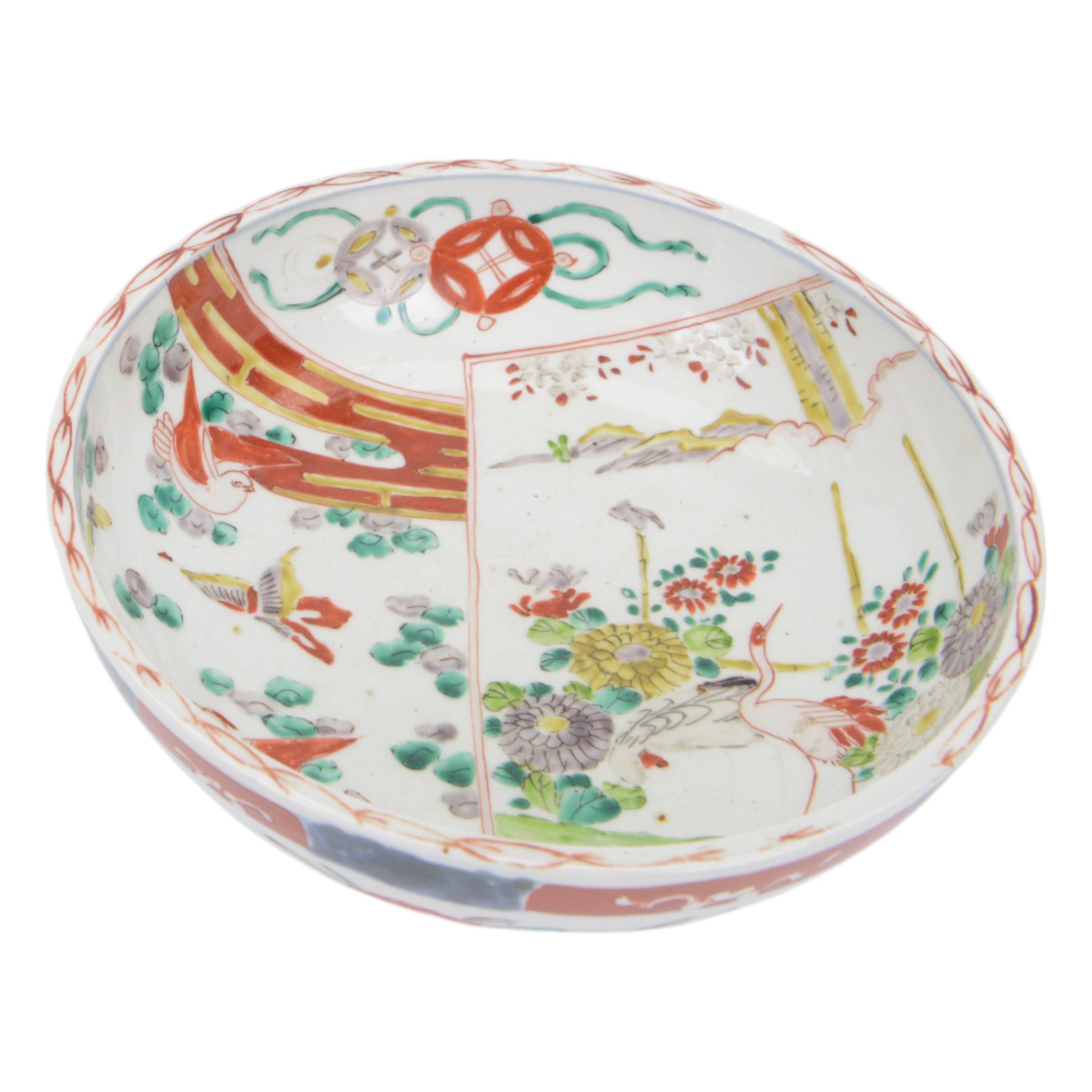 Japaneses imari bowl, decorated to the interior with a crane within a landscape, birds and insects, the external decoration of foliate scrolls, D25cm 