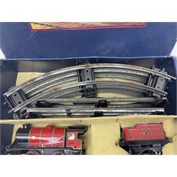 Hornby '0' gauge - 1950s M1 Goods Set box containing clockwork 0-4-0 steam locomotive and matching tender No.3435 with brake, forward and reverse lever and key, together with two 4-wheel LMS open goods wagons and oval of curved and straight tin-plate track and connectors; boxed with illustrated lid