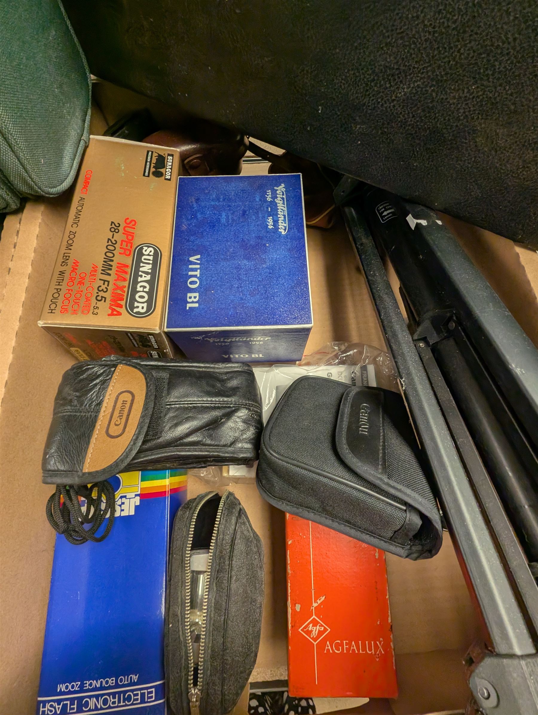 Voigtlander Vito BL camera, boxed, Pentax PC-5000, Canon SSure Shot Af7, Hanimex Rondette 1200A projector, Jedson trumpet, JVC Compact VHS camera, McClure projector, two briefcases and camera accessories