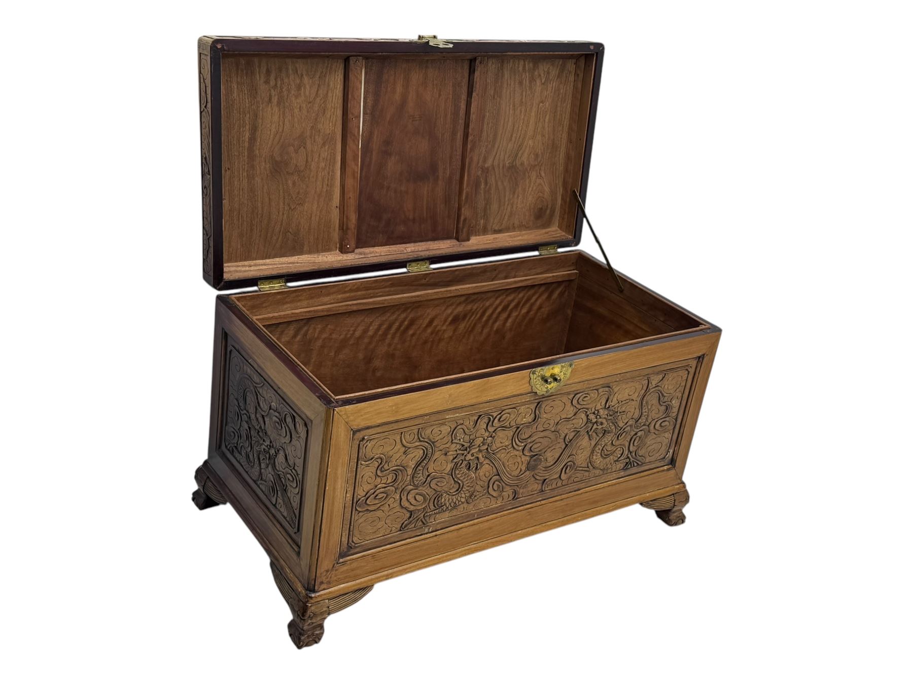 Chinese camphorwood blanket chest with stylized dragon carved decorated lid
