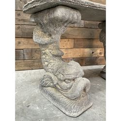 Cast stone four piece curved Dolphin bench, set with three dolphin pillars, curved rectangular slab top with detailed border