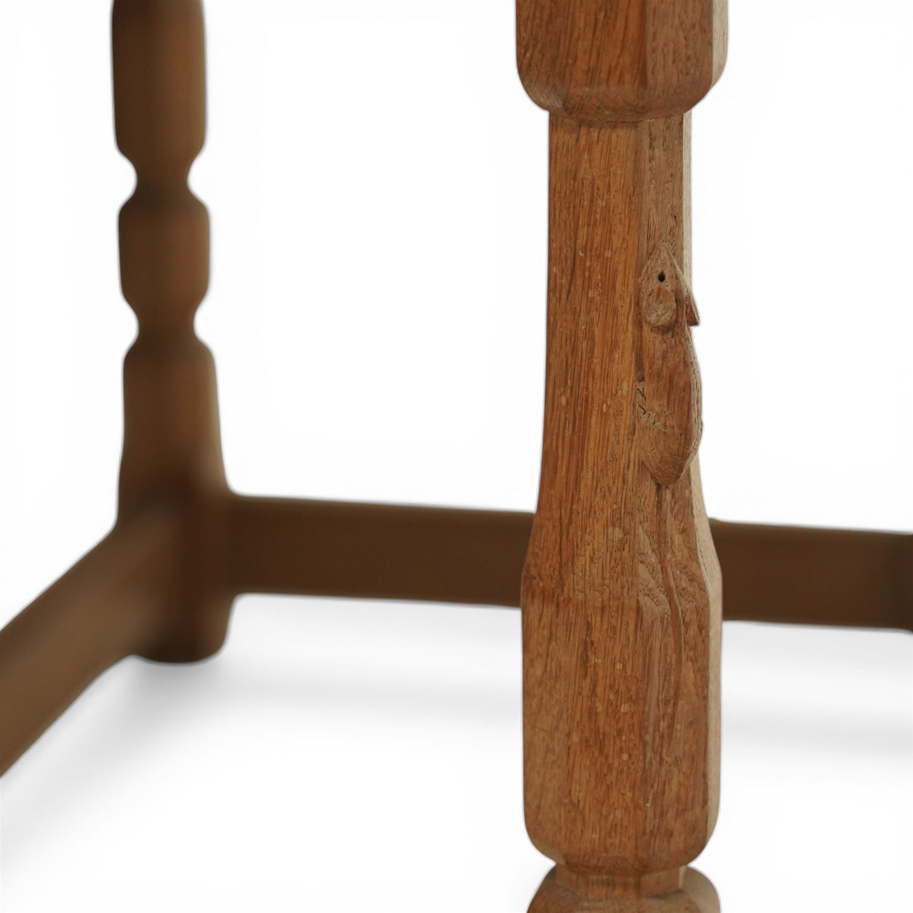 Mouseman - oak side table, rectangular adzed top, fitted with two drawers with turned wooden knobs, raised on octagonal supports, with carved mouse  signature, by the workshop of Robert Thompson of Kilburn