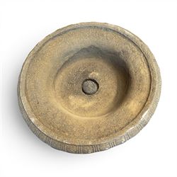 Pair of cast stone garden urns of kylix form on pedestals, the broad egg-and-dart moulded rim over a shallow gadrooned underbelly, with waisted tapering base, raised on matching plinth bases with faux panelled facia