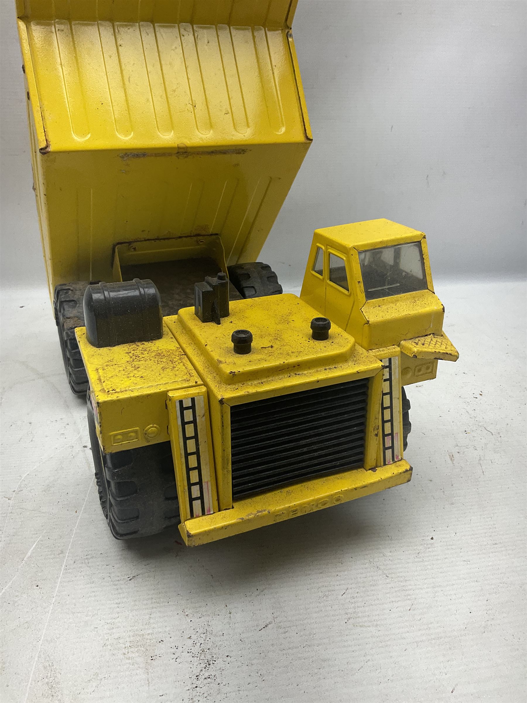 Tonka - five large scale pressed steel vehicles comprising Cement Mixer, Mighty Mobile Crane, Jeep and two Dumper Trucks (5)