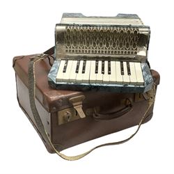 Small German Alvari piano accordion with blue pearline case, thirteen keys and eight buttons L30cm; in carrying case