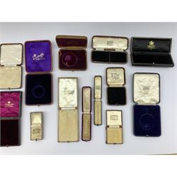 A collection of 19th/ early 20th century jewellery boxes to include a set of three heart shaped velvet boxes and others by Munsey & Co., J. W. Benson Ltd, Hancocks & Co., John J. Hancock, M. Heaps, Stewart Dawson & Company, Biggs, F. Woodman, Fattorini & Sons etc 