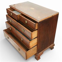 George III crossbanded mahogany chest, rectangular top with crossbanded edge and oval satinwood medallion, two short over three long graduated drawers with brass swan neck handles, raised on shaped bracket feet