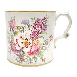 Large 19th century Staffordshire mug with scroll handle, the white glazed ground transfer printed with floral and fruiting sprays, further detailed with monogram in gilt, H13cm D13.5cm