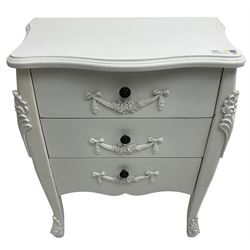 French design white painted chest, shaped top over three drawers, each with applied swags with flower heads, flanked by cabriole uprights with foliate mouldings