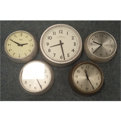  A 'National' electric slave clock in metal case, three others in metal case and a 'Smiths' ECS electric slave clock in painted case  