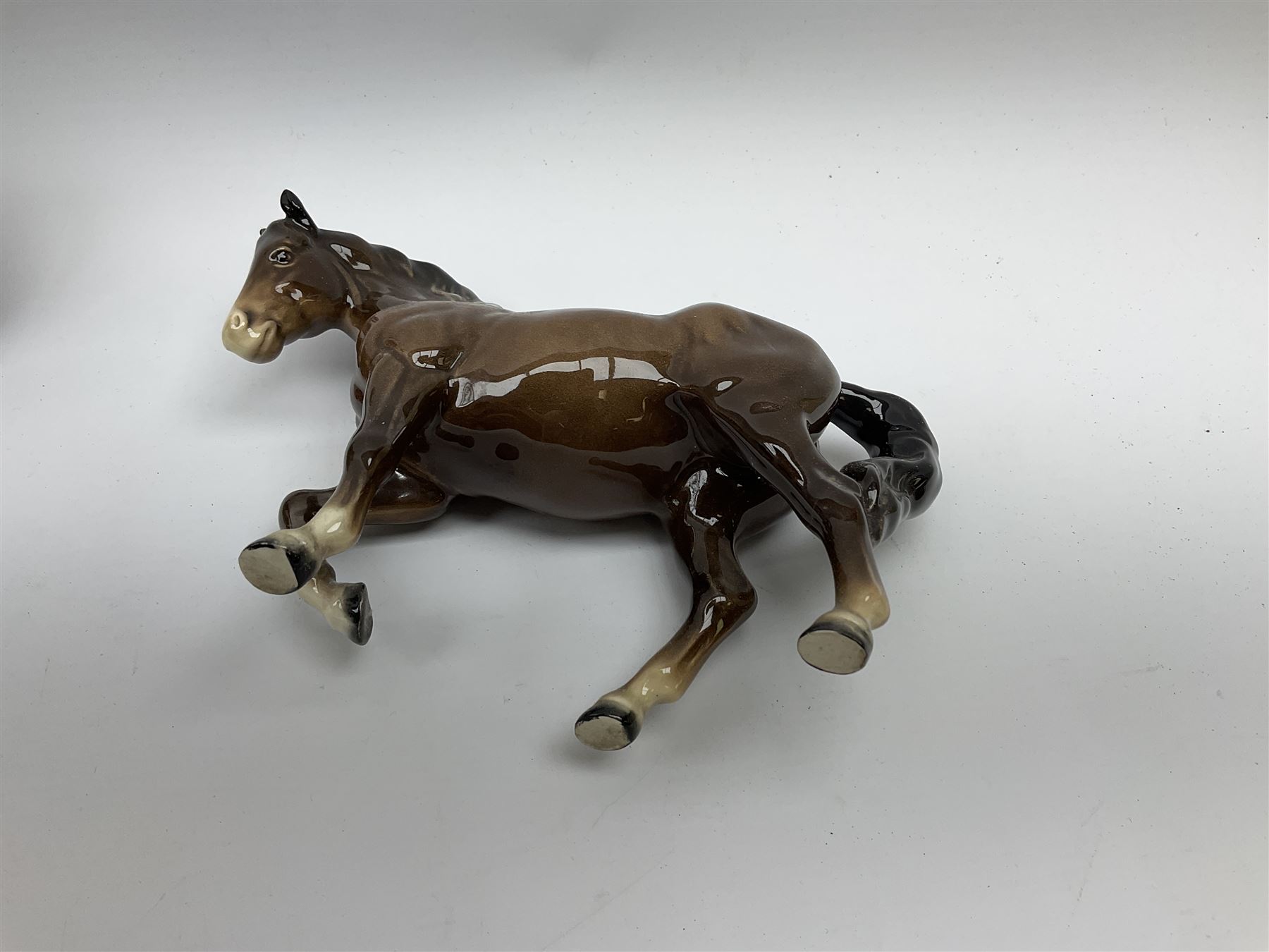 Two Beswick horse and 'Champions All' Wall Plaques, Arkle and Red Rum.