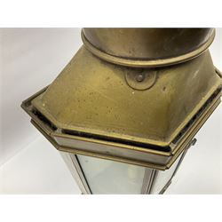 Large brass maritime lamp by Griffiths & Sons Birmingham with swing handle, threaded mounting bracket and associated oil burner, H41cm excluding handle