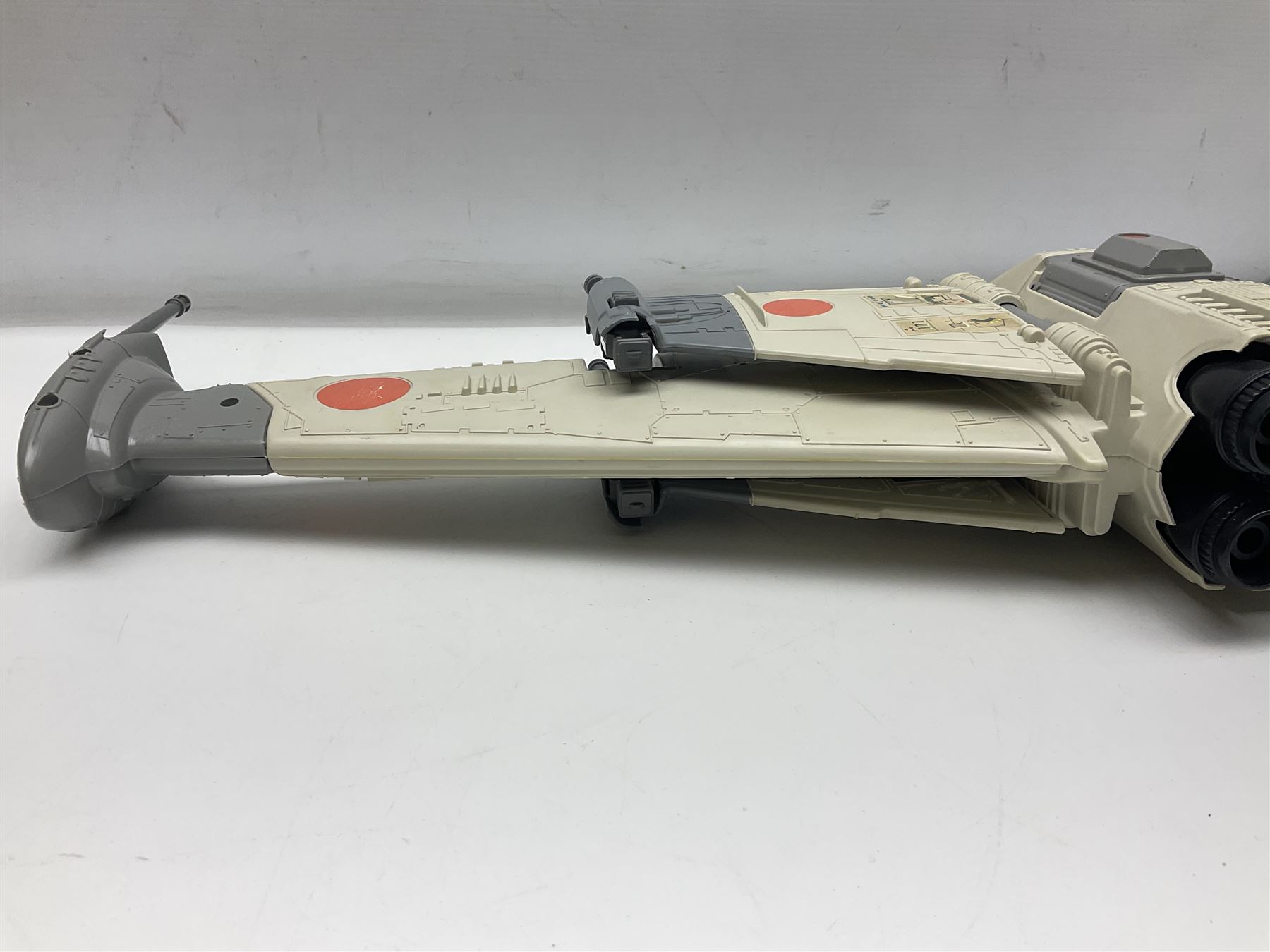 Star Wars - three space vehicles comprising B-Wing fighter and large Millenium Falcon space ship; both with instructions; and Boba Fett Slave 1; all unboxed (3)