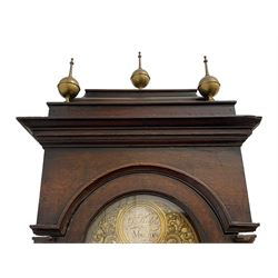 Gilbert Kidd of Malton (North Yorkshire) - late 18th century oak 8-day longcase clock c1780,  with a tall double caddy top and later brass ball and spire finials, break arch hood door beneath with attached pilasters and wooden capitals,  plain trunk with a long flat topped door, raised on a square plinth with applied skirting,  brass break arch dial with the makers name to the silvered boss in the break arch, engraved and silvered dial centre and chapter ring, with cast spandrels and matching steel hands, subsidiary seconds dial and square calendar aperture, dial pinned directly to a rack striking movement with a recoil anchor escapement, sounding the hours on a cast bell. With pendulum and weights.
The Kidd family were a prolific family of provincial clockmakers working in Malton from the mid 18th century until the early 19th century. Many of their clocks are simply signed 