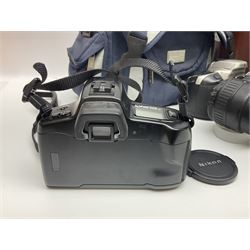 Four Minolta camera bodies, to include Dynax 500si, serial no. 94812651 with 'Signa Zoom 1;3.5-4.5 f=28-70mm' lens, Maxxum 300si, serial no. 97821665, with 'Tamron AF 80-210mm' lens and Dynax 300si, serial no 01603265'  with Minolta AF Power Zoom 35-80mm 1;4' lens, etc, together with Pantax MV1 camera bodies and other camera equipment 