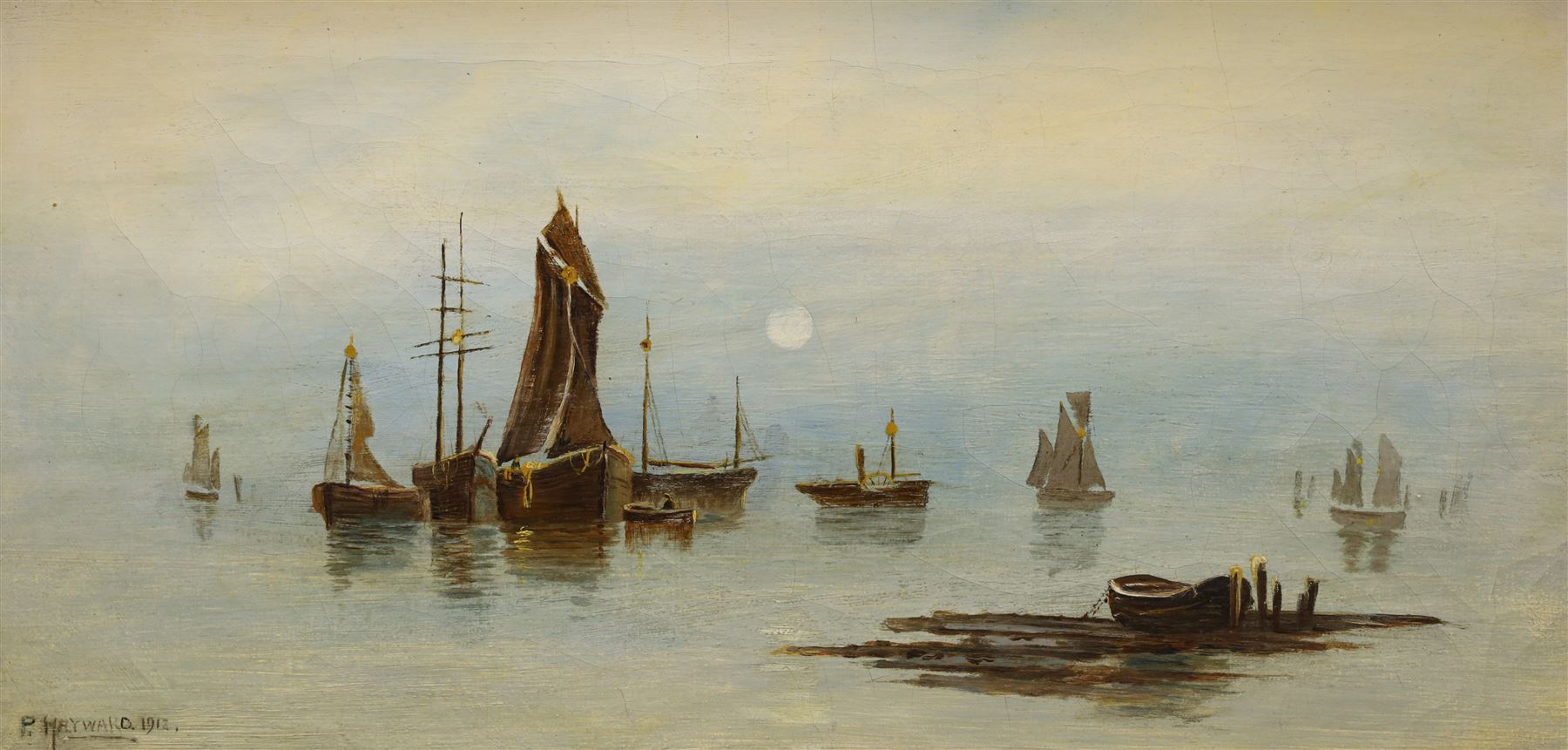 P Hayward (British 19th/20th century): Sailboats on Calm Seas, oil on canvas signed and dated 1912, 24.5cm x 50cm