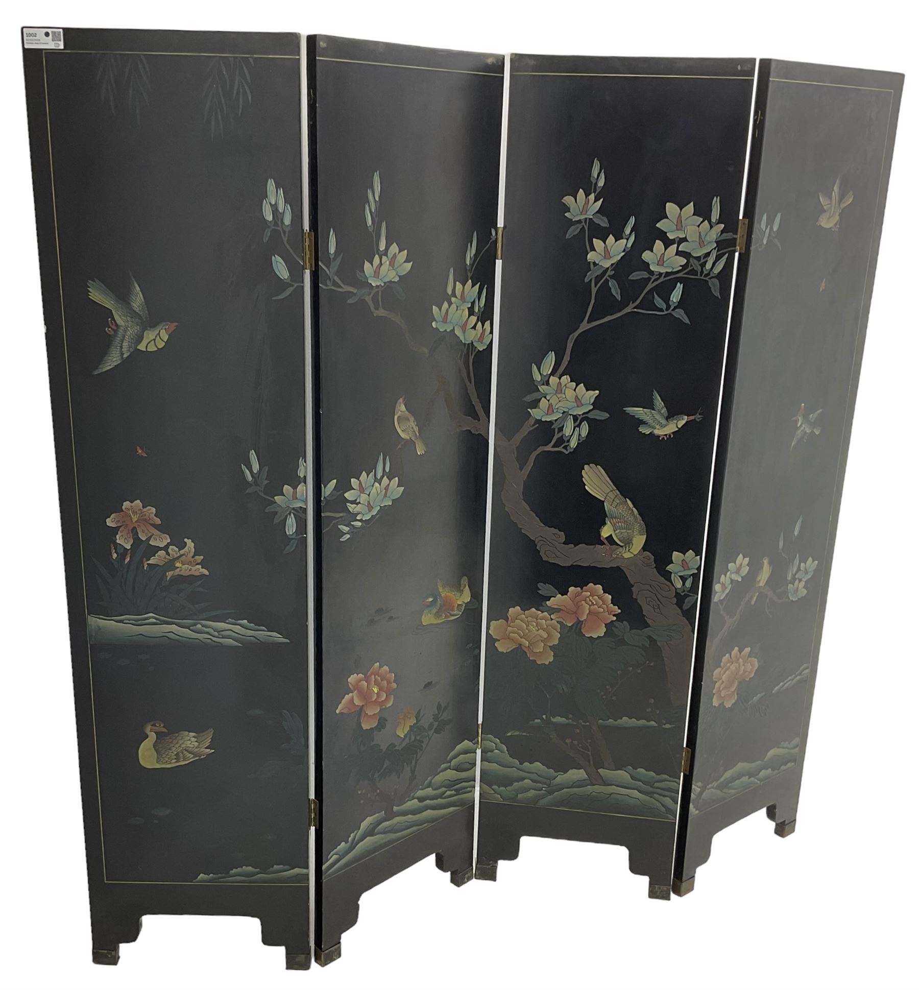 Chinese four-panel folding room screen, black lacquered with a naturalistic scene decorated with trees, birds and flowers