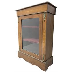 Victorian walnut pier cabinet, moulded rectangular top over inlaid frieze, decorated with gilt metal mounts and beading, the glazed single door flanked by inlaid uprights, on moulded plinth base