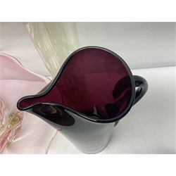 Two Whitefriars glass jugs, together with a Swedish Pukeberg art glass vase and three art glass bowls, including large pink example, some signed to base, tallest H30.5cm