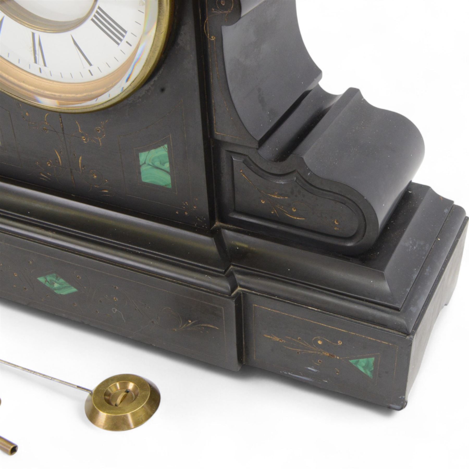 French- Belgium slate mantle clock c1880, drum movement case with voluted side supports and incised gilt decoration with contrasting panels of malachite inlay, two part enamel dial within a glazed cast brass bezel, with a visible Brocot escapement and cornelian pallets, Roman numerals and steel spade hands, twin train rack striking movement striking the hours and half-hours on a bell. With pendulum and key. 