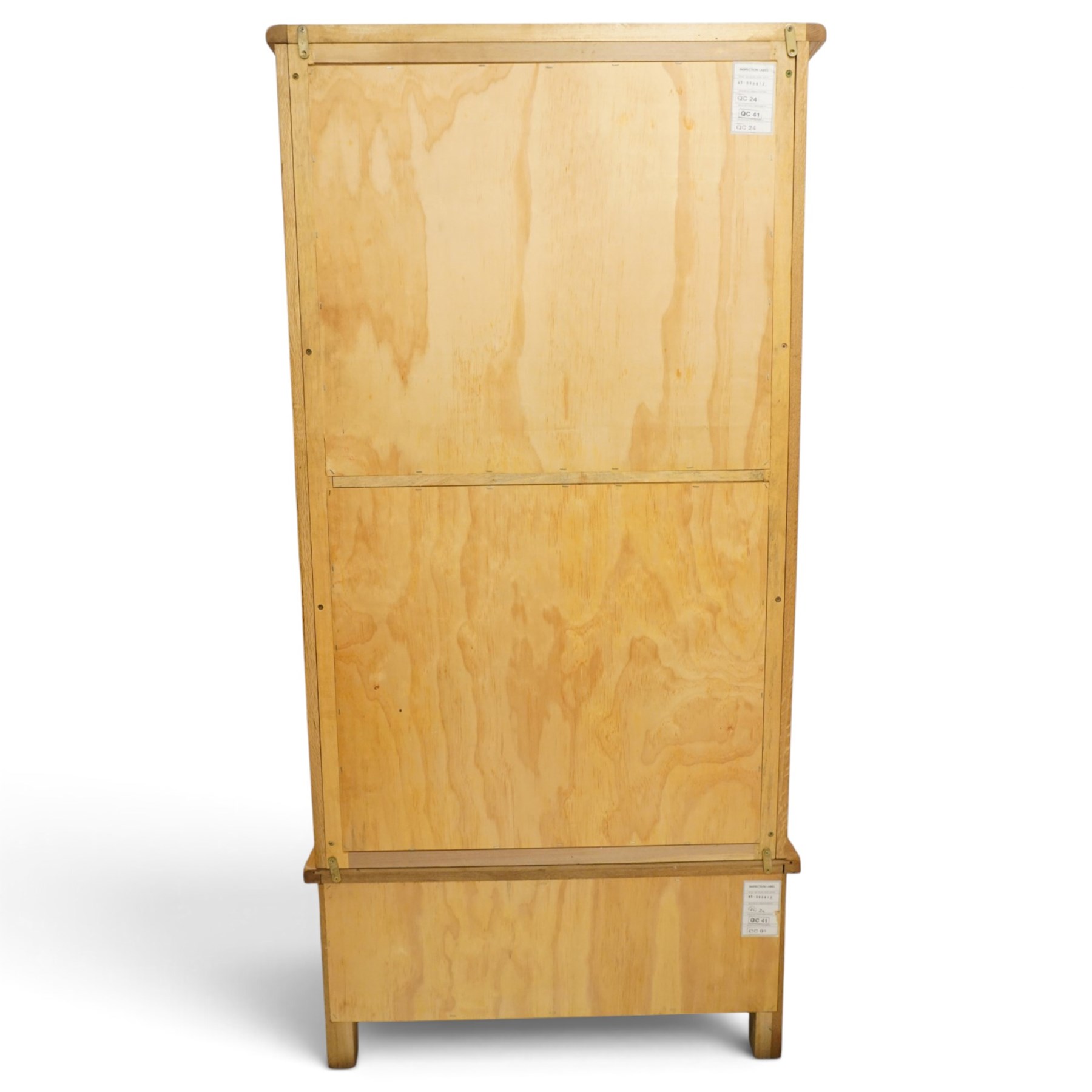 Contemporary light oak double wardrobe, fitted with two panelled cupboards over single drawer
