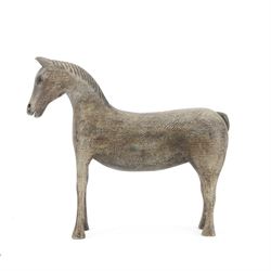 Carved Folk Art wooden horse, with glass eyes, H33cm