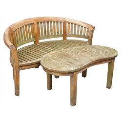  Hardwood garden bench, slatted back with curved top rail, slatted serpentine seat on square supports, W164cm, D67cm, H88cm and a similar kidney shaped table, W120cm, D59cm, H51cm    