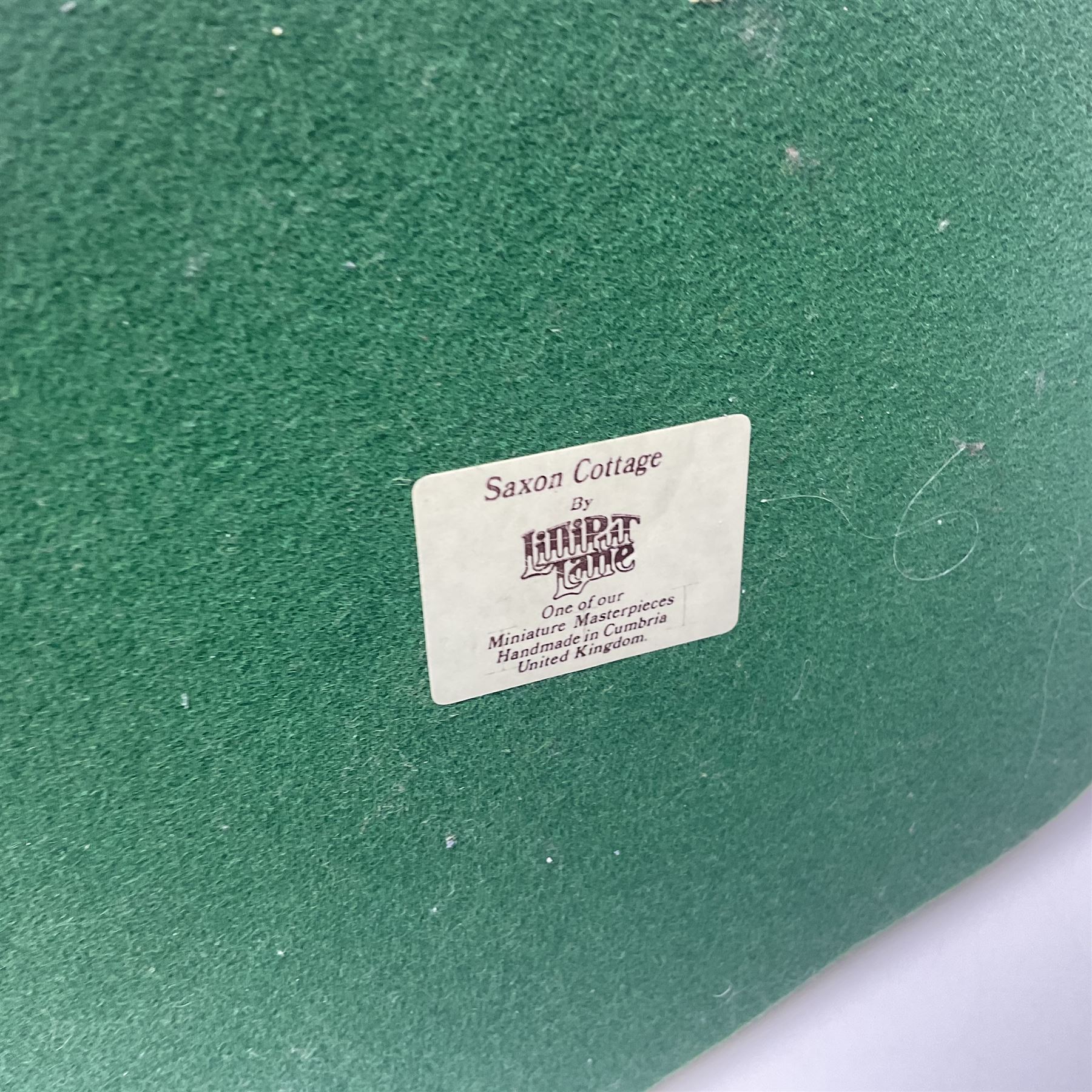 Ten Lilliput Lanes, comprising from Midlands Region Witham Delph, Jun and Disorderly, From South West Region Puffin Row, Moonlight Cove, The Cuddy, and from South West Region, The Rustlings, Saxton Cottage (1988), Marigold Meadow, Calendar Cottage and Little Lupins, all with boxes and deeds 