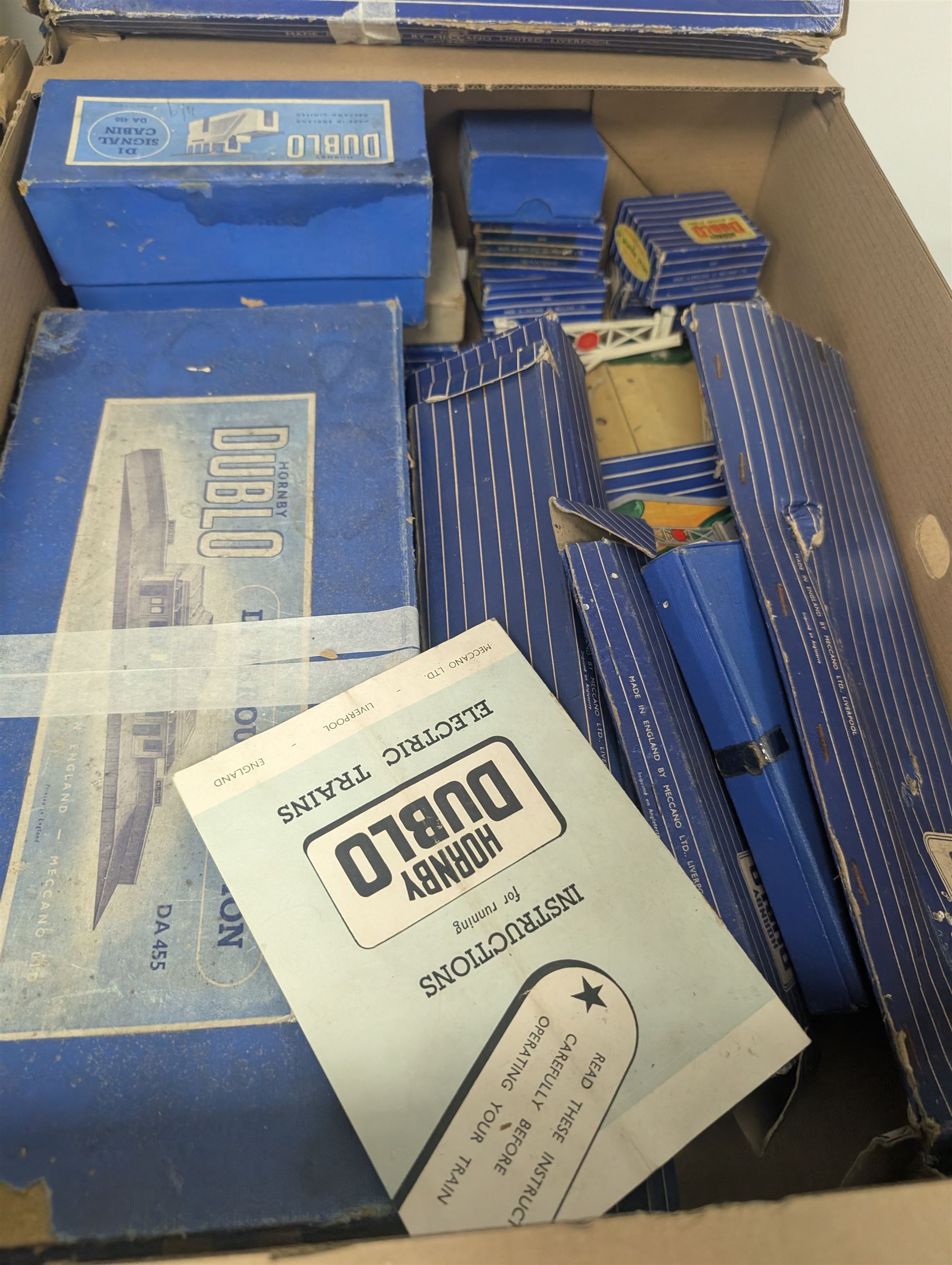 Collection of Hornby Dublo three-rail model railway rolling stock, track and accessories, some boxed