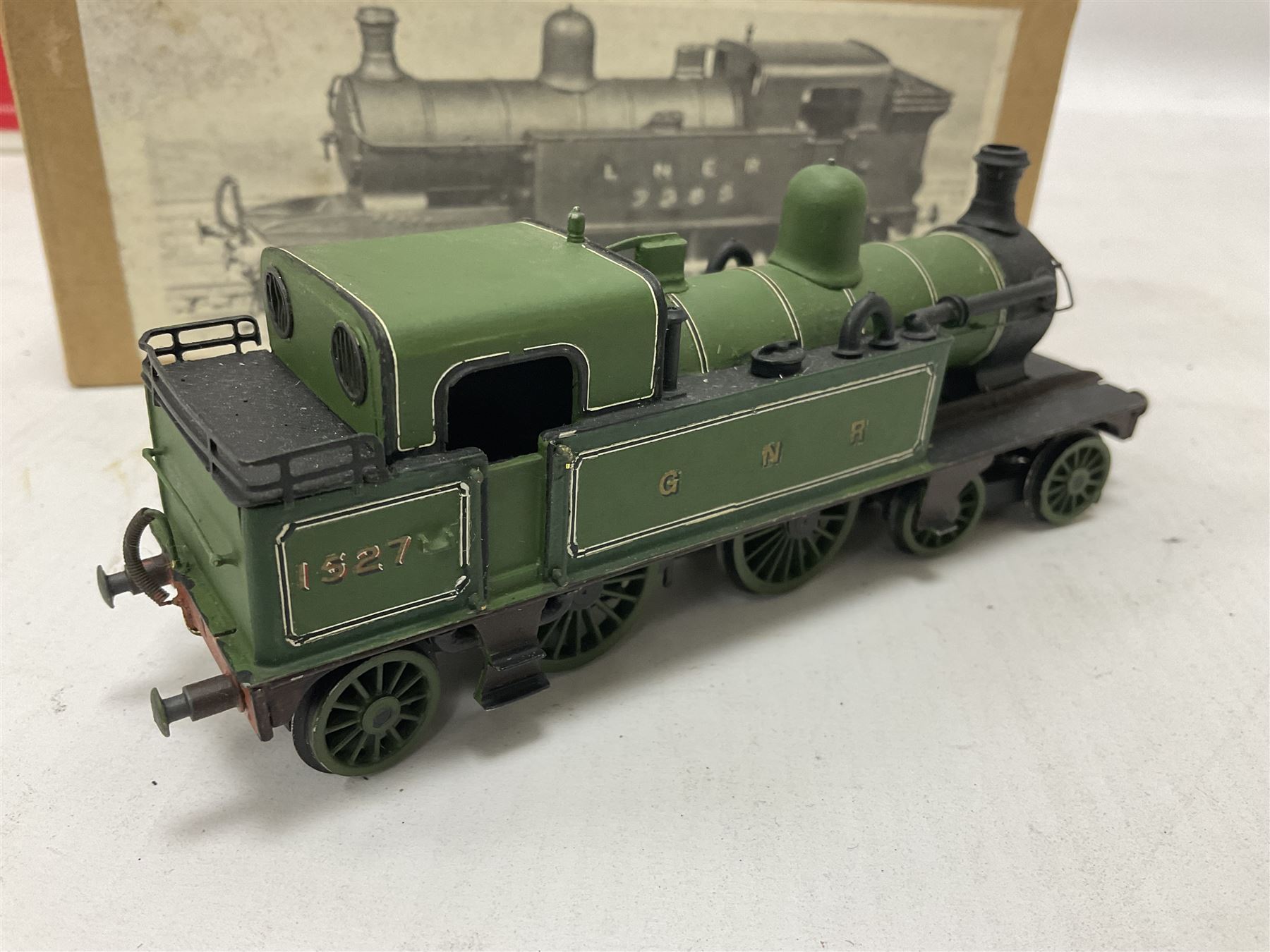 ‘00’ gauge - two kit built steam locomotives comprising Class N7 LNER/BR 1/4/5 0-6-2T no.69614 finished in BR black with South Eastern Finecast box; Class C12 GNR/LNER/BR 4-4-2T no.1527 finished in GNR green with plain brown box labelled ‘Finecast’ (2) 