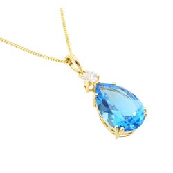 18ct gold blue topaz and diamond pendant necklace, single pear cut Swiss blue topaz of approx 6.60 carat, suspending from a single round brilliant cut diamond of approx 0.15 carat