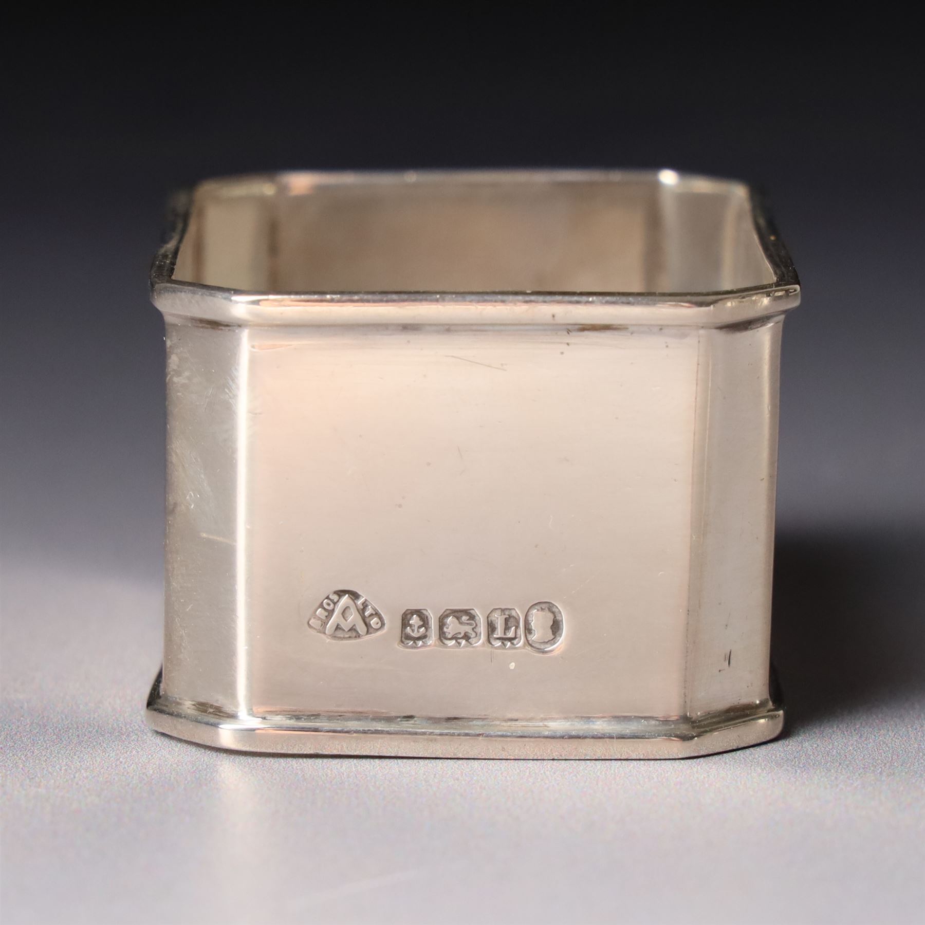 Pair of late Victorian silver napkin rings with engraved decoration Birmingham 1899 and seven other silver napkin rings
