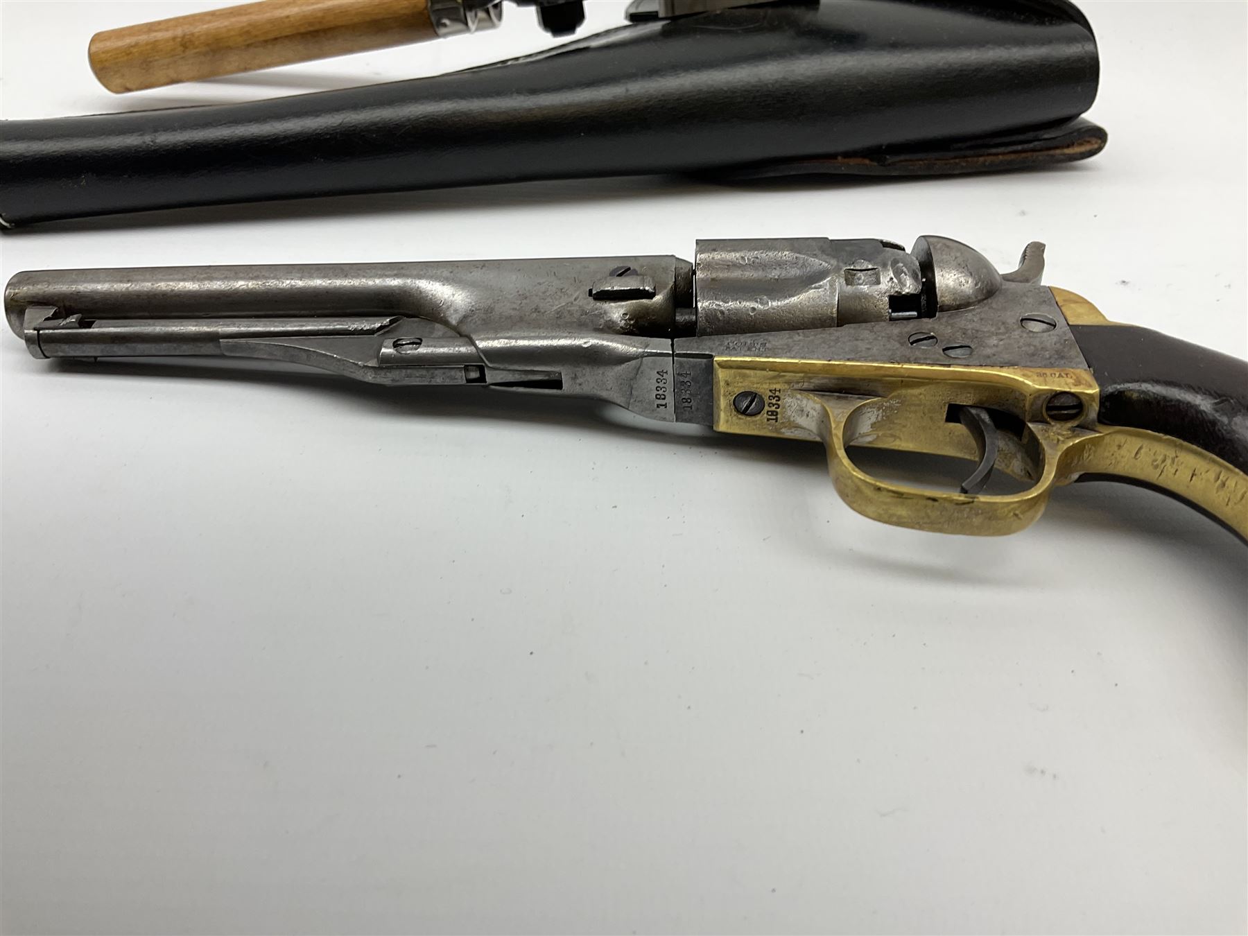 Colt .36 calibre percussion five-shot police pocket revolver, all parts with matching serial no.18334, 14cm barrel marked 'Address Col Saml Colt New York US America' with under barrel swivel rammer, brass trigger guard and backstrap with two-piece wooden grips L28.5cm; with modern bullet maker and leather holster.