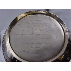 George III Irish silver teapot, of squat circular form, the body with repousse and chased floral and C scroll decoration, with capped C handle and ivory insulators, engraved to base 'Presented to Troop Sergeant Major John Percival, of the 4th Dragoon Guards by Alex D. Tait, Esq, late Captain in that corps as a mark of approbation of his steady and upright conduct when Sergeant Major of his Troop, Dublin, June 2nd 1843', hallmarked William Law, Dublin 1817, H12.5cm, This item has been registered for sale under Section 10 of the APHA Ivory Act