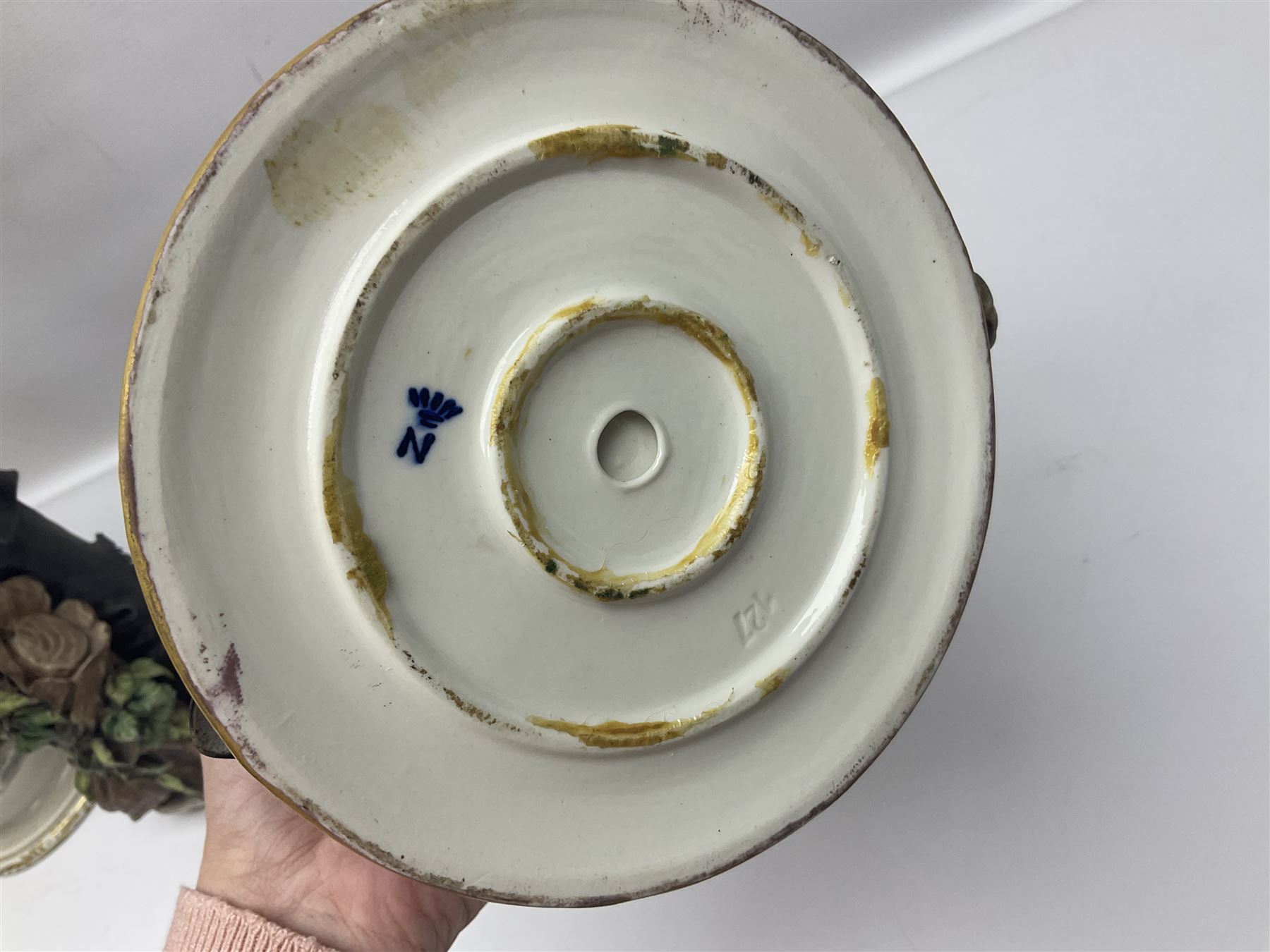 Three Capodimonte figures, to include The Kind Heart Man, modelled by Cortese as a tramp with two doves, The Young Falconer by Maria Angela and another modelled as a tramp darning his socks, all with printed marks, tallest H39cm