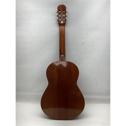 Spanish BM acoustic guitar with mahogany back and sides and spruce top L101cm; in cello carrying case; Roland foot pedal and two Yamaha foot pedals; tin D# organ pipe; folding music stand etc