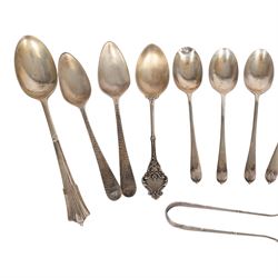 Collection of silver cutlery, including sugar tongs, coffee bean spoons, teaspoons, etc, all hallmarked