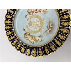 Mid 19th century Sevres Louis Philippe period porcelain cabinet plate, decorated with central Louis Philippe crowned monogram flanked by two cherubs, within cobalt gilt detailed border, with date mark for 1846, red inventory mark for Chateau des Tuileries, and blue monogram mark , D14.5cm
