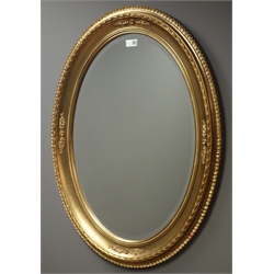 Rectangular gilt framed bevel edge mirror (W91cm, H66cm), and two oval gilt framed mirrors  