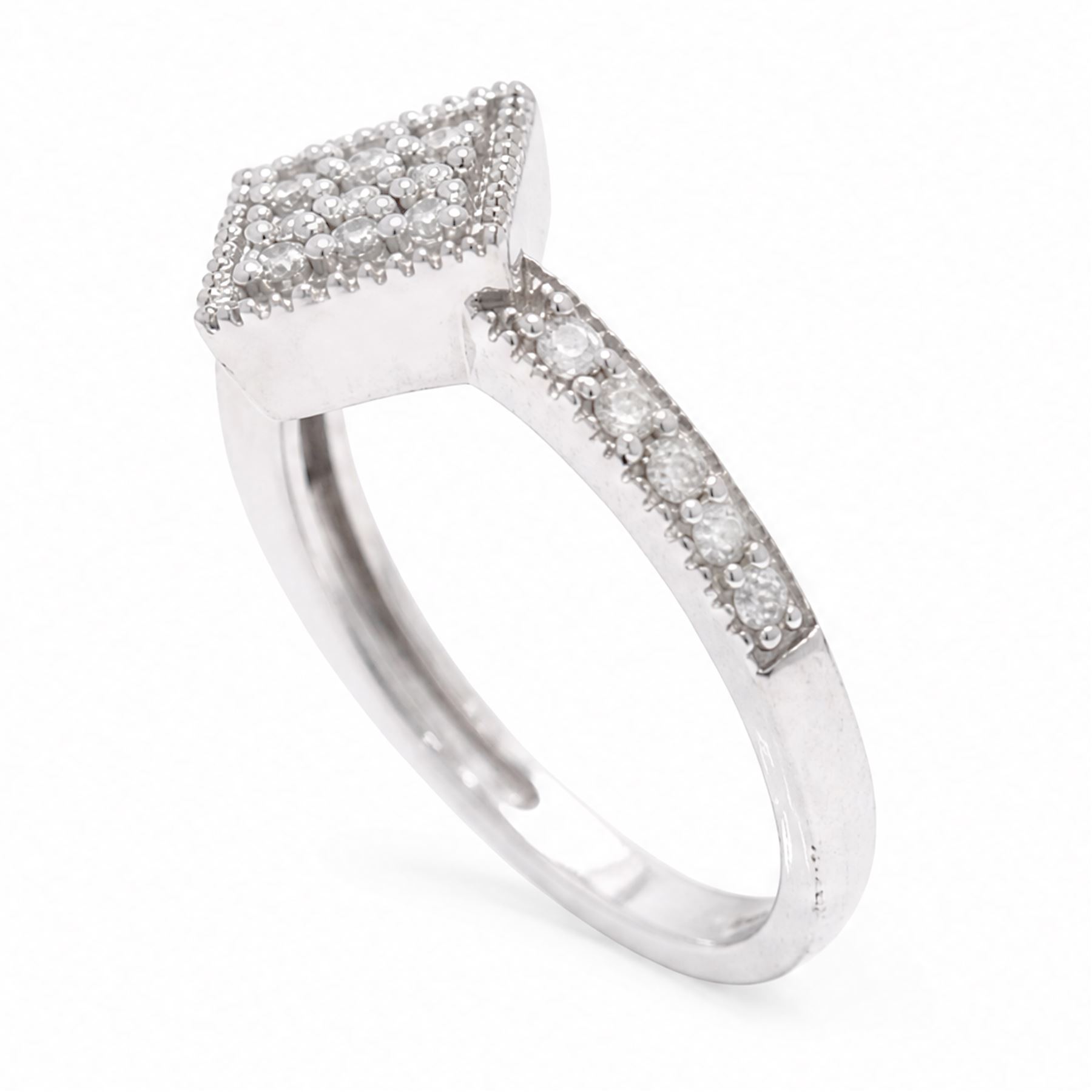 9ct white gold diamond shaped diamond ring, pave set with nine round cut diamonds, with diamond set shoulders, Birmingham 2006