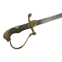 WWI Prussian Artillery Officer's dress sword, with 83cm single edge fullered steel blade, brass stirrup hilt, the langet with crossed cannon barrels and a vacant shield cartouche, the curved knuckle bow cast with acorns and oak leaves, wire bound grip and lion head pommel, with steel scabbard, overall L100cm