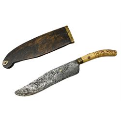Mid-19th century Singhalese knife pia kaetta, the 15cm steel blade with punched decoration and inset yellow metal disc, and carved pistol grip, in plain wooden scabbard L25.5cm overall