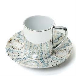 Damien Hirst (British 1965-); set of six anamorphic silver lustre espresso cups and saucers of various designs