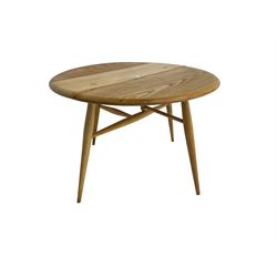Ercol - elm and beech '308 Folding Occasional Table', circular top with gate-leg and splayed tapering supports