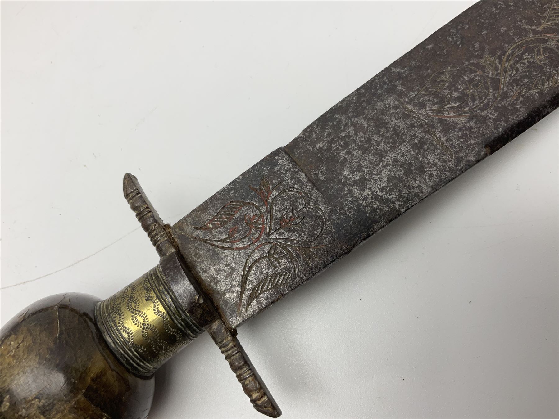 19th century continental folding knife with 15.5cm single edged blade, the pierced brass and iron handle with remains of horn grips L21.5cm overall closed; turned horn handled knife with foliate engraved blade; battlefield relic German 1884/98 knife bayonet; iron spear head; leather covered swagger stick; and two-piece gun cleaning rod