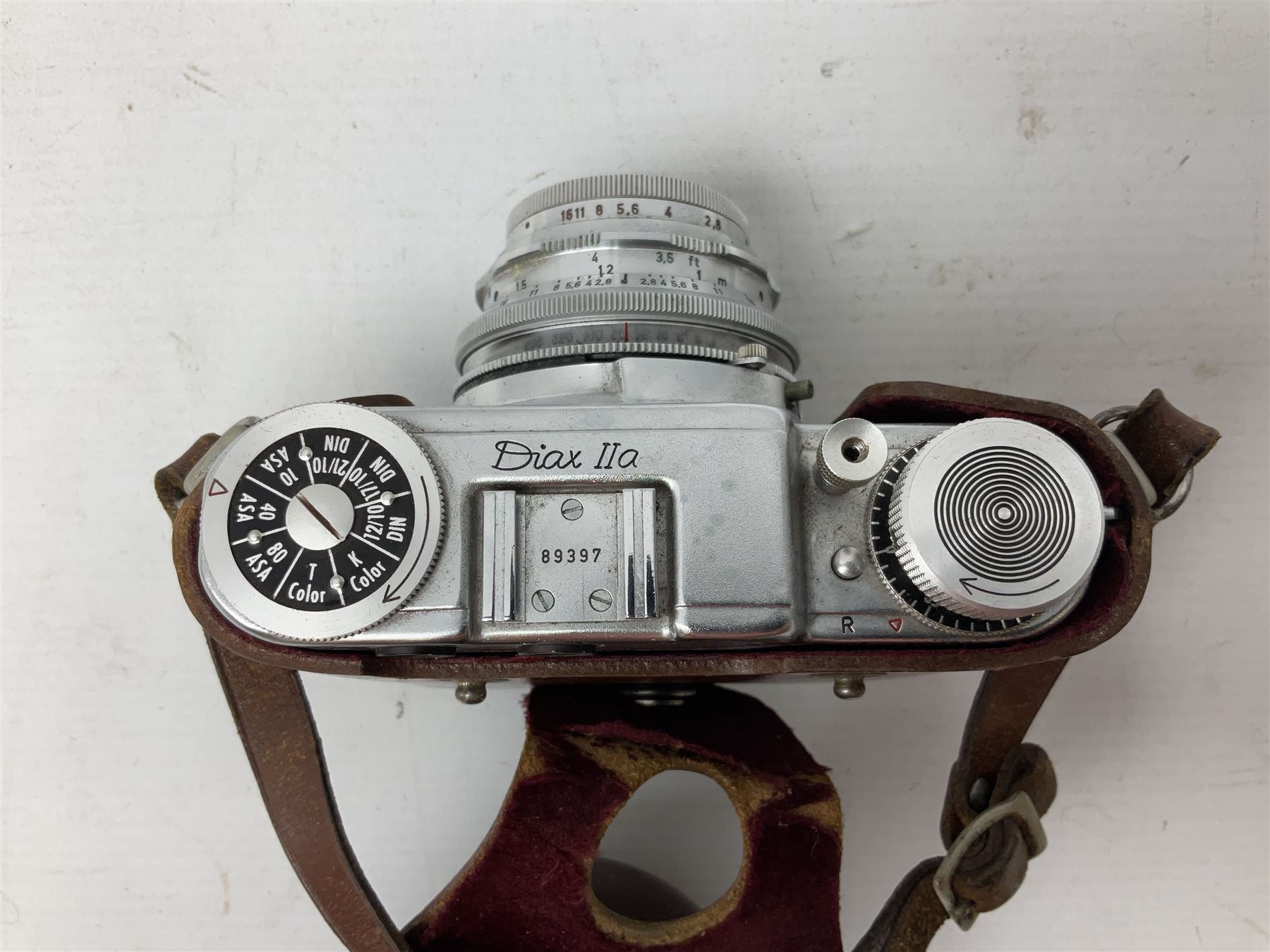 Diax IIa Rangefinder camera body with 50mm f/2.8 Xenar lens, in leather camera case