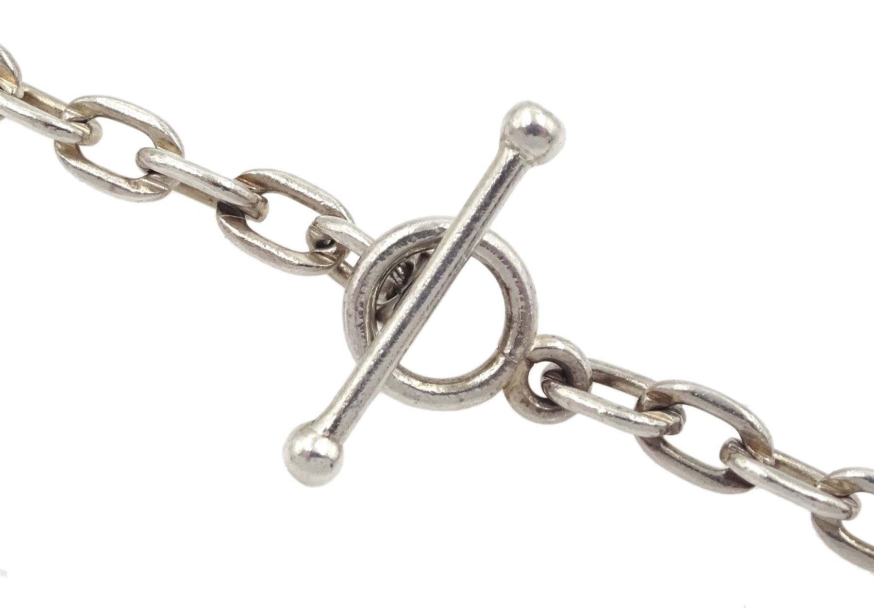 Georg Jensen silver geometric pendant necklace, with T-bar clasp, designed by Astrid Fog, No. 379, London import mark 1973, boxed