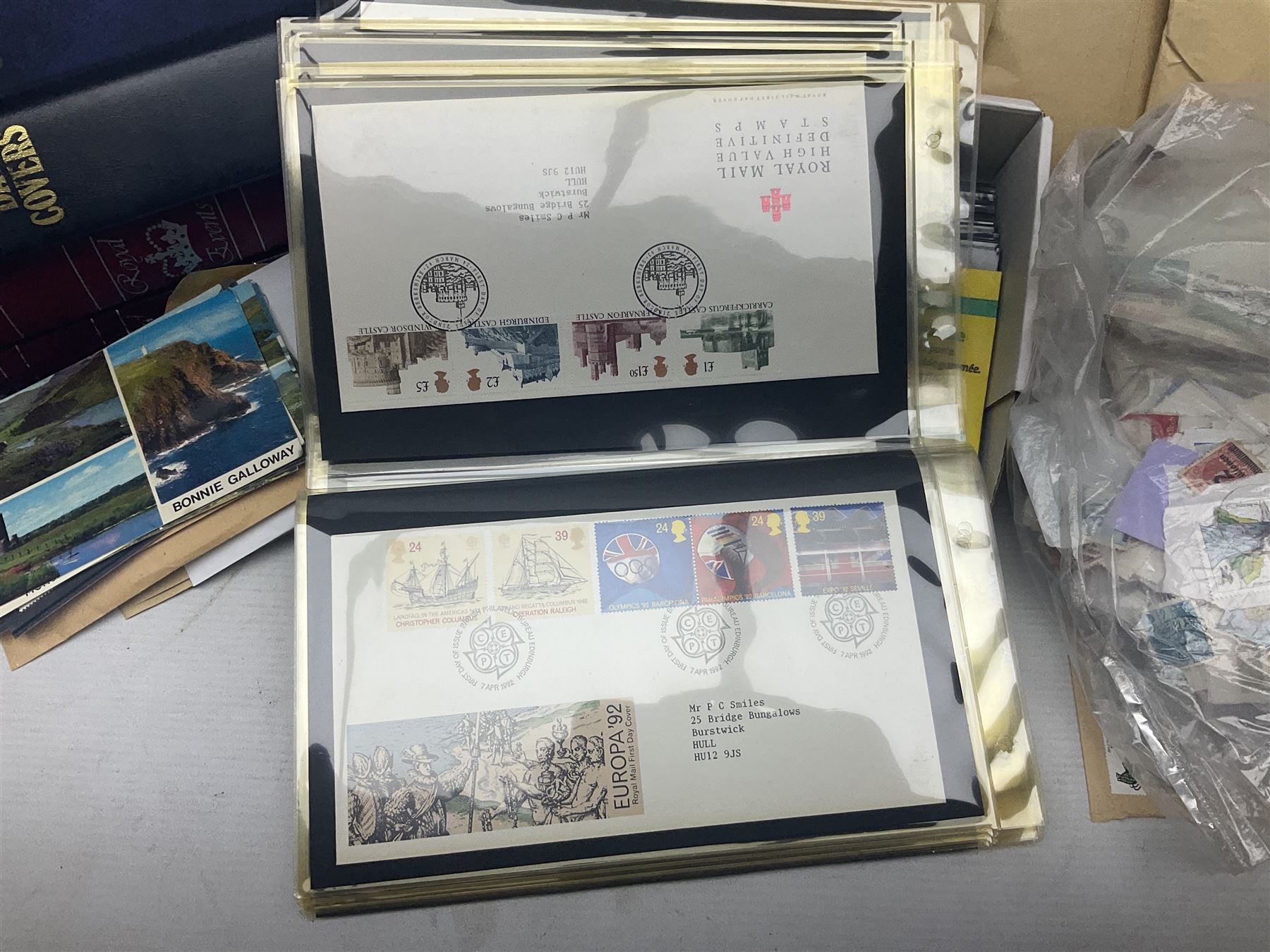 World stamps including Australia, Antigua, Canada, New Zealand, St Vincent, Republic of Maldives, Norfolk Island, Malta etc, Great British and other first day covers, Queen Elizabeth II 60th Birthday commemorative stamps etc, housed in five albums/folders and loose, in one box