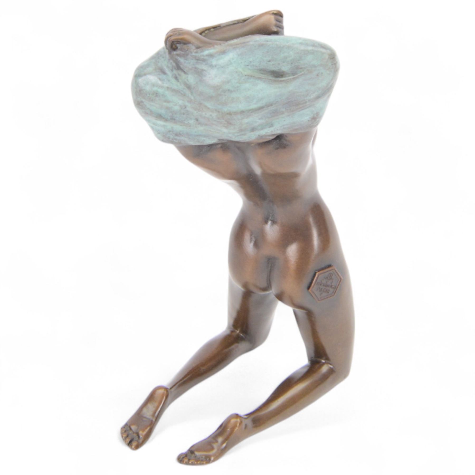 Bronze figure, modelled as kneeling nude woman removing her shirt, signed Milo, H17cm