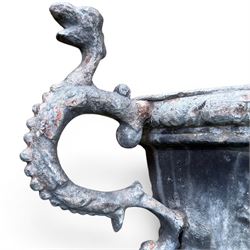 Impressive pair of early highly decorative lead garden urns, griffin handles with ornate decoration depicting cherubs and laurel wreath